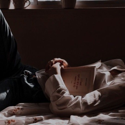 Holding Her Books Like Her First And Only Lover