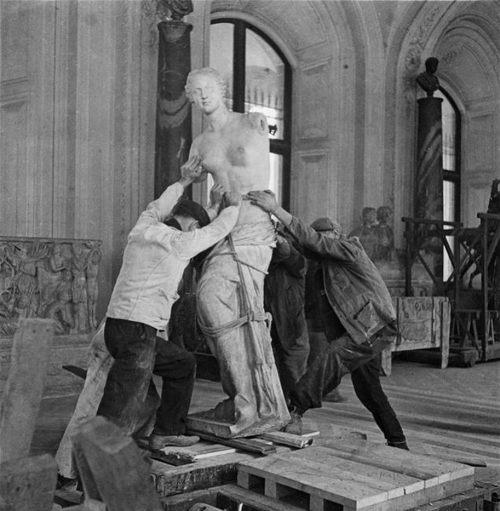 hauntedbystorytelling:Laure Albin-Guillot :: Packing the Venus de Milo at the Louvre museum, 1940/ m