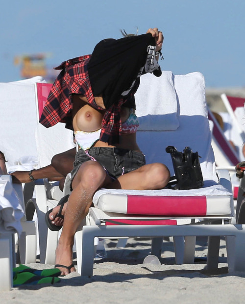 toplessbeachcelebs:Martha Graeff (Brazilian Fashionista) bikini slip in Miami (December 2013)