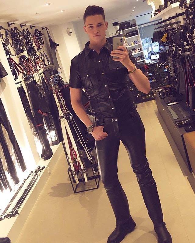 punkerskinhead: hunk in leather in a great looking shop