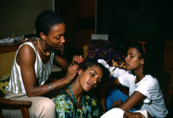 ahmedloso:  Bruno BarbeyGABON. A young woman’s hair is styled in traditional “corn rows” at a salon in Libreville. 1984. 