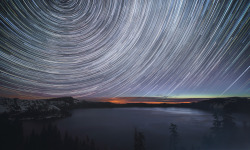 americasgreatoutdoors:  The stars circle around the North Star on a cold winter evening in Crater Lake National Park in Oregon. Michael Bonocore captured the movement of stars in the night sky — called star trails — by combining 400 separate images. 