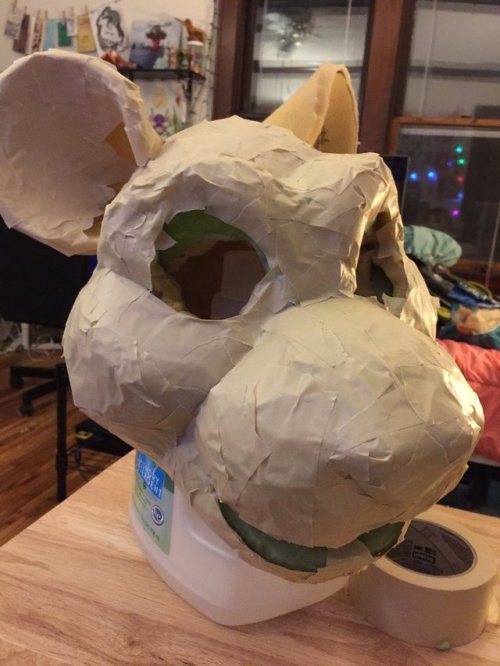 concept art, furs, foam sculpt and taped up fursuit head i’ve been workin on lately! His name is Alm