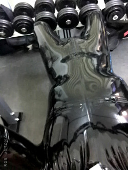 letsplaykinkynl:  Working out in chastity with a layer of tight rubber over it 