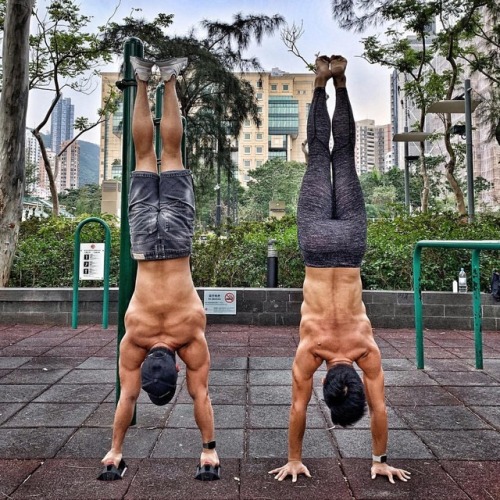 yogaexposure:Handstand by two people. One is a #streetworkout superstar, the other is a #yogi - with