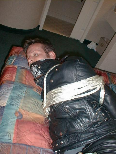 bubbabrando:  jhardcastle1976:  The best way to keep a guy in a leather biker jacket, tied up and his big mouth gagged  yes, it was quite effective. 