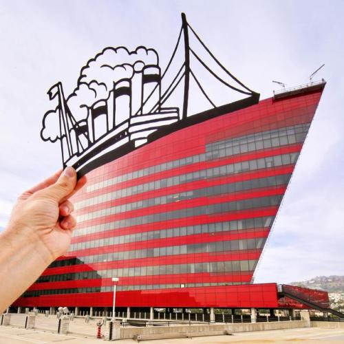 archiemcphee:  Meanwhile London-based artist Rich McCor, aka paperboyo (previously featured here), continues to travel the world using simple paper cutouts to cleverly transform famous landmarks and other buildings into awesome new attractions. Suddenly