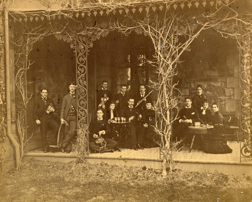 Musicians at Princeton, 1860s-1980s:1. Eight unidentified students hanging out on Princeton&rsq