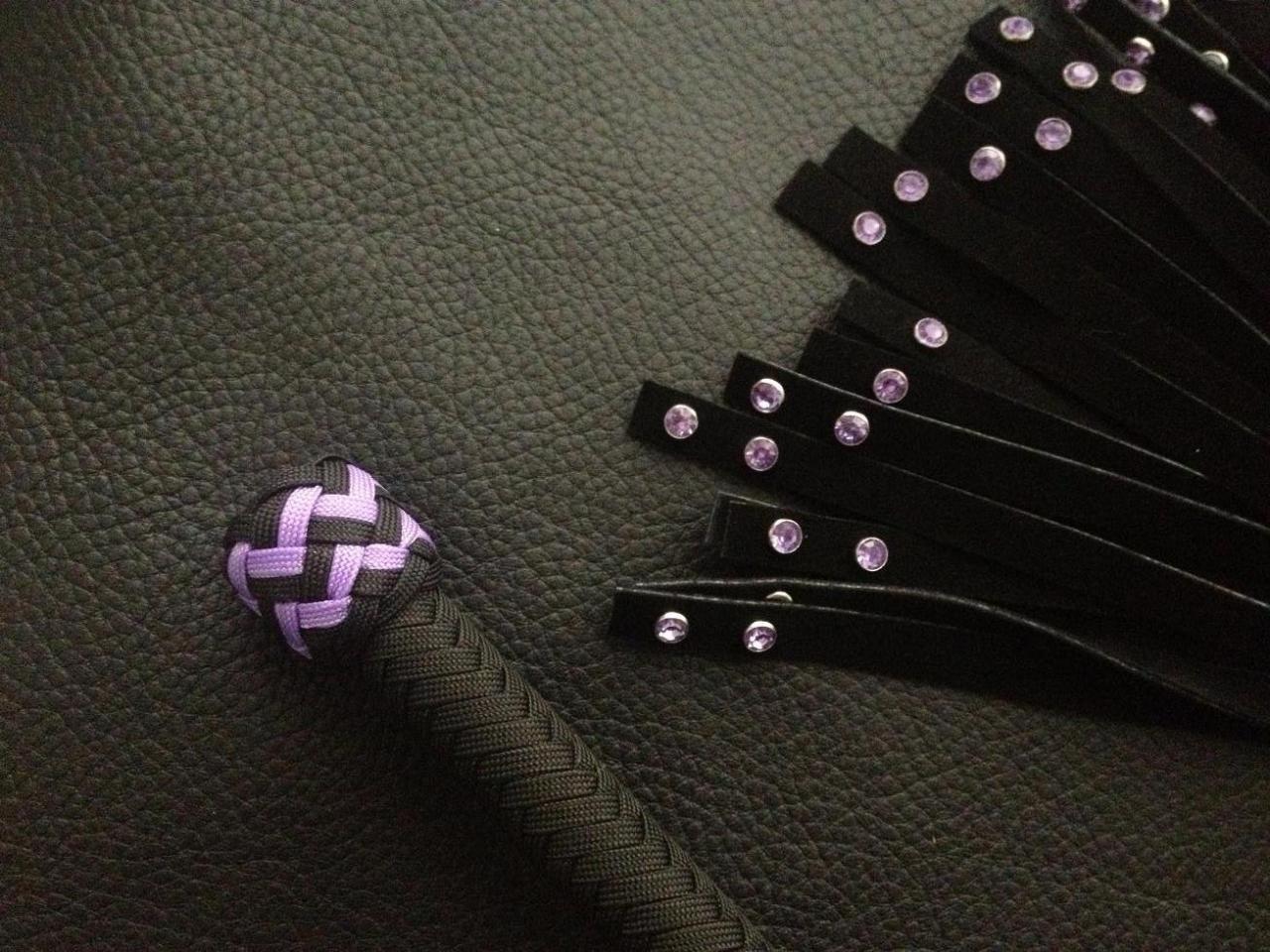 edgeplay-co-uk:  Large black suede flogger with purple studs - only one available