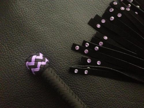 edgeplay-co-uk:  Large black suede flogger with purple studs - only one available - Impact-Toys.com   Oh my - those studs would sting.  *Evil Grin*