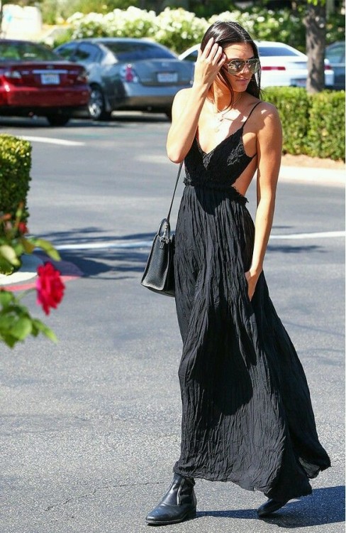 I love how Kendall Jenner paired a pair of boots with this pretty cut out maxi dress