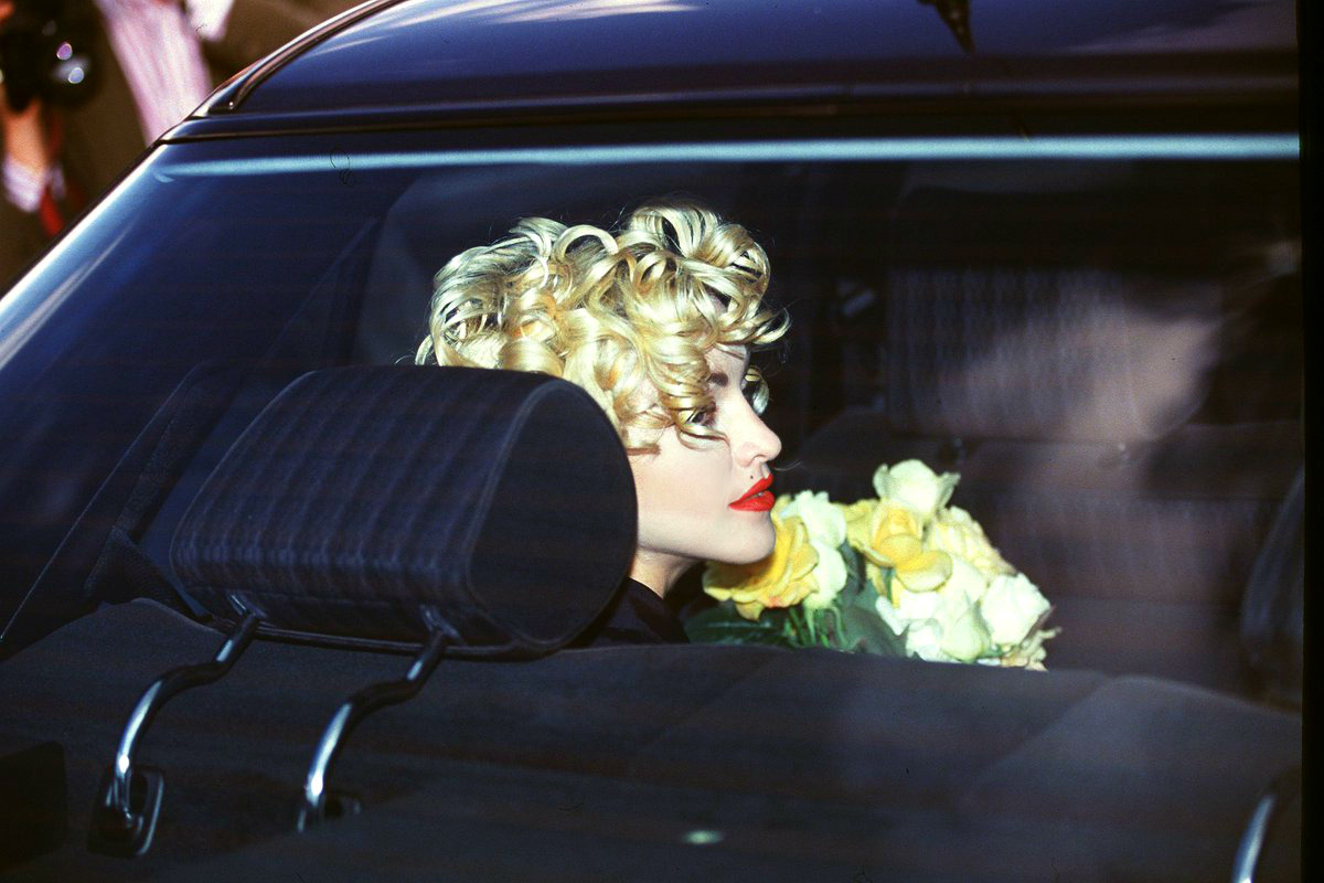 ohyeahpop:Madonna driven to her hotel in 1990 during the Blond Ambition Tour.