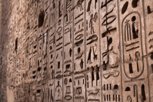 Egyptian Hieroglyphs Sunken reliefs of hieroglyphic inscriptions adorn the walls of the mortuar