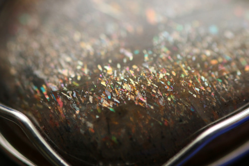 Sterling silver sunstone pendants and close ups of their fascinating rainbow colored sparkling shoot