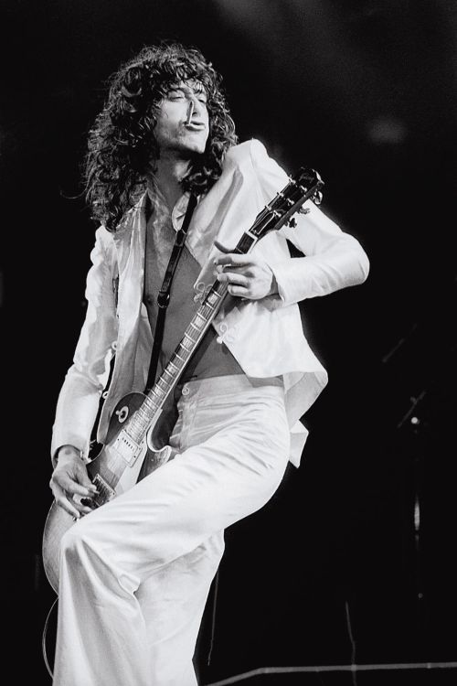 soundsof71:Jimmy Page smoking duckface, 1977, by Neal Preston