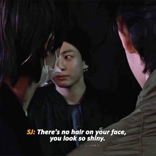 The Members Gathered Around Jungkook Petting Him For Wearing A Beanie 
