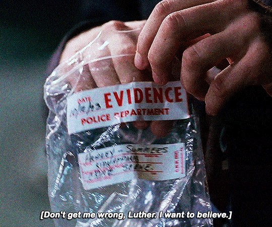 gifset of a scene from The X Files.
gif 1 of 6. a hand grabs a piece of cloth out an evidence bag and gives it to someone.