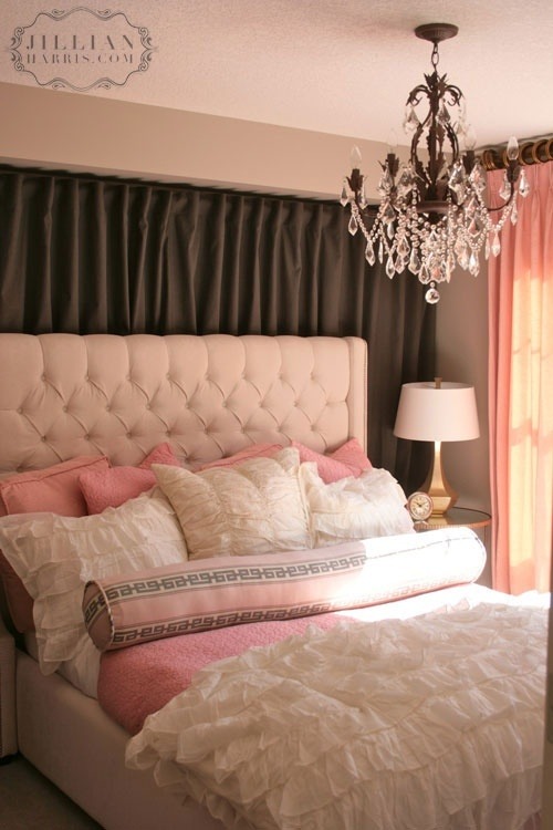 Black tufted bed with storage