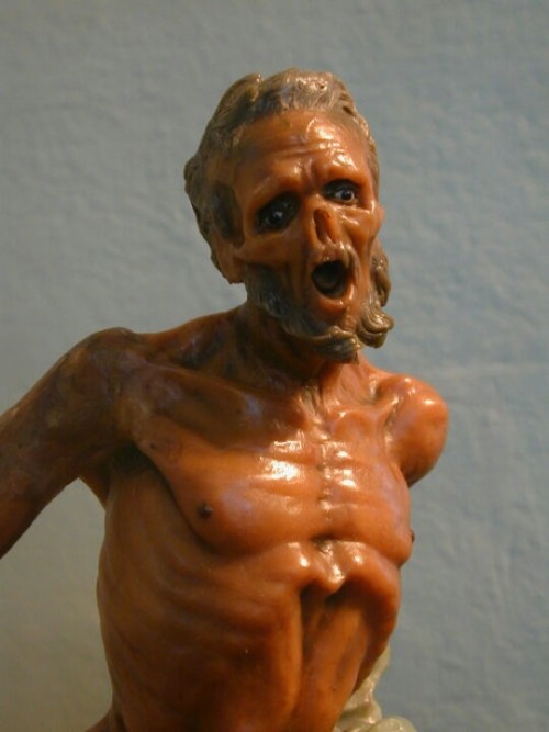 Representation of a victim effected by the Plague by Gaetano Giulio Zumbo. About 5” tall and sculpted from wax in the 17th century