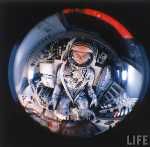 John Glenn training in a mock-up of the planned Mercury capsule(Ralph Morse. 1959)