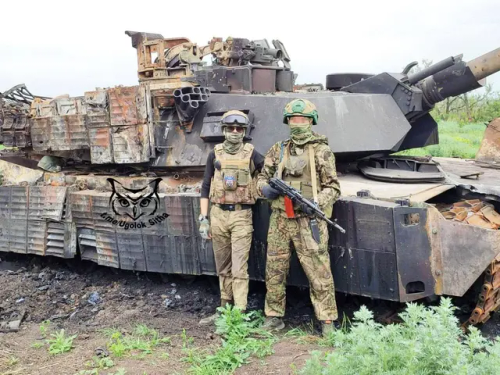Russian Soldiers Pose With A Destroyed Ukrainian M1A1 Abrams