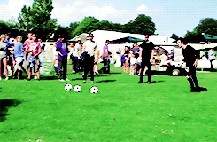 jaurmone-deactivated20190412:  Matty and George from the 1975 play football @ the Isle of Wight Festival 