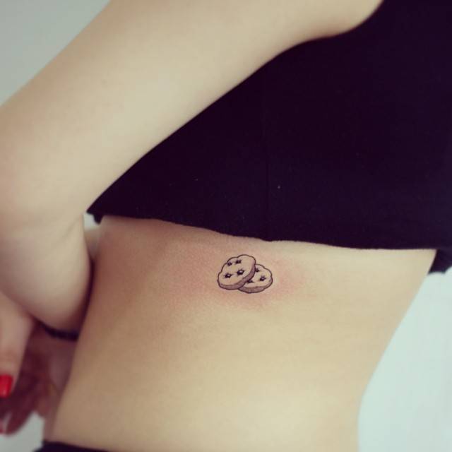 Little Tattoos — Cookie tattoo on the left side. Tattoo artist: Doy