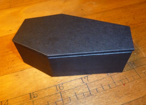 lorenzocheney: I made a tiny little coffin box for book &amp; paper arts class! It looks much be