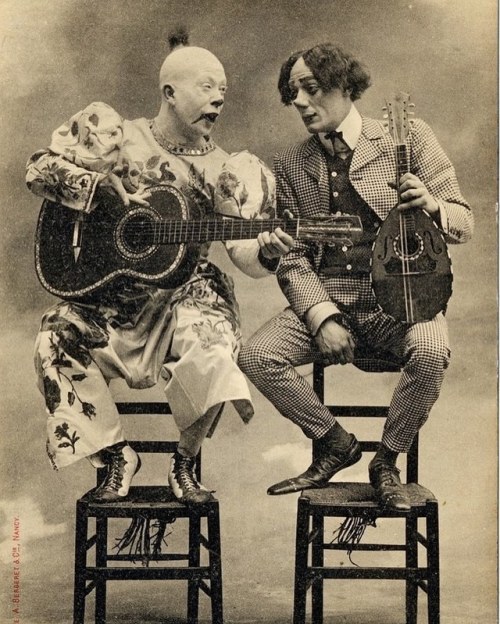 warrenpearce69:A couple of vintage clowns having a singalongadoo c1900s #blackandwhitephotography #m