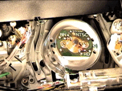 jesseengland: The video camera is plugged into the VCR, allowing it to record itself being poked and prodded. GIF’d version of Vide-Uhhh! (2005) 