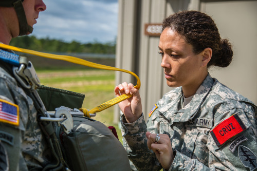 SOLDIER STORIES: Silver wings in her blood.First Sgt. Sandrea Cruz conducts a Jumpmaster Personnel I
