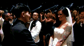 dailydot:  34 couples tie the knot during Macklemore performance