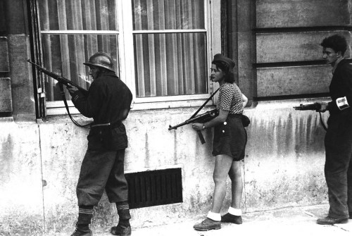 Three members of the Resistance on a patrol to rout out the Germansnipers still left in areas of Par