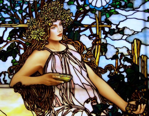 naturalbuildingencyclopedia:  https://www.flickr.com/photos/painterglass/albums/72157624456028100   “Figure painted by Jim Berberich , stained glass created by Bogenrief Studios. All beads and book detail hand painted .” Alphonse Mucha is the inspiration