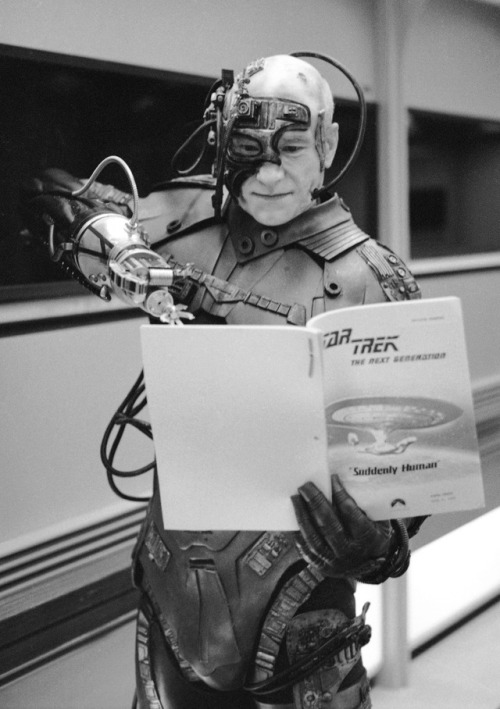 humanoidhistory: Patrick Stewart, in costume as Borg convert Locutus, reviews the script while filmi