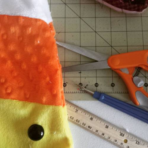 Working on some new stuff for the shop! Can you guess what it is? #halloween #plush #plushartist #ca