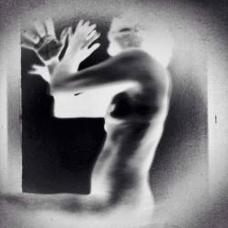 vivipiuomeno1:  Karen Bentham ph. aka Caran Caravan (b. in Derby 1959) Black and white figure - Pinhole techniques