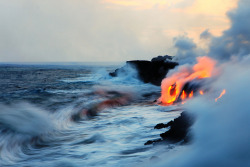  Lava meets water off the shores of Hawaii