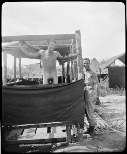 hinnerkc:  bobsnakedguysblog: Relaxing at the camp showers.  As this is an UK Forces camp during WW II and the two guys look quite British too, it must be noted that there is a circed cock visible: At least British upper class men were usually clipped