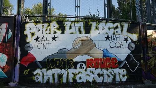 “Support you local black & red antifascists”Mural in Toulouse, France