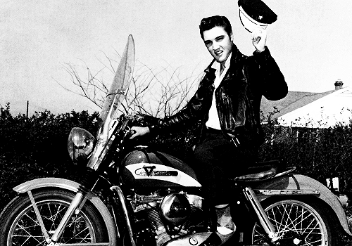 vinceveretts:  Elvis photographed on his Harley-Davidson for The Enthusiast magazine,