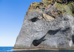 Tzke:  Sixpenceee:   Natural Rock Formation Looks Like An Elephant Drinking From