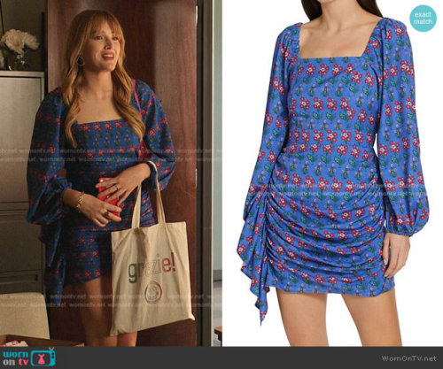 Kirby’s blue floral mini dress on Dynasty Mina Side-Drape Dress by Rhode at Neiman Marcus, $393 (was