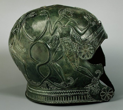 archaicwonder:Greek Bronze Helmet, Crete, c. late 7th century BCTwo large confronting horses in repo