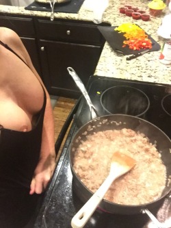 slange78:  soccer-mom-marie:  Braless cooking!  Titties and chili make a wonderful meal, don’t ya think? 😘😘Her   @slange78 could make boiled water look yummy! 😘  Awe thanks Hun. 😘😜Her