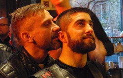 Leatherman whispering naughty things into his boy&rsquo;s ear.