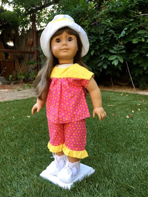 Samantha is ready for recess in her adorable play clothes.  Her hat keeps the sun off her face and h