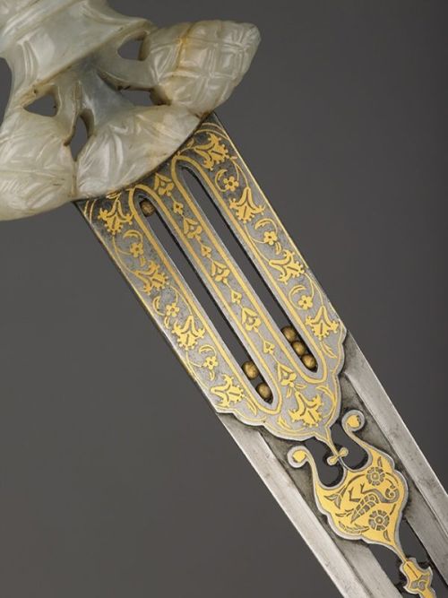 art-of-swords:  Ceremonial Dagger Dated: 16th century - 17th century Culture: Indian and Iranian Medium: carved jade and Khorássán steel Measurements: blade length 19.6 cm Source: Copyright © 2015 The Wallace Collection 