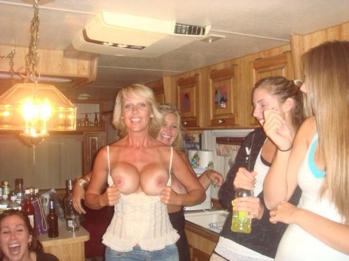 harrys519:  drunkpartysluts:  naked-party-girls:  Apparently this hot mom wanted to get in on the party action so whipped out her tits and flashed everyone in her daughter’s party.  No complaints here! More Naked Party Girls  Make Money Online! (But