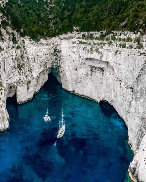 Blue Caves, Paxos island by Angelos Danalis. That’s where I went for vacation last summer. The wate